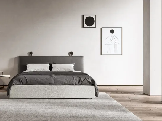 Letto con testiera in pelle e giroletto in tessuto Delfi di Presotto